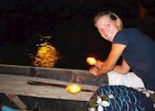 Carol setting off prayer offerings along the Ganges